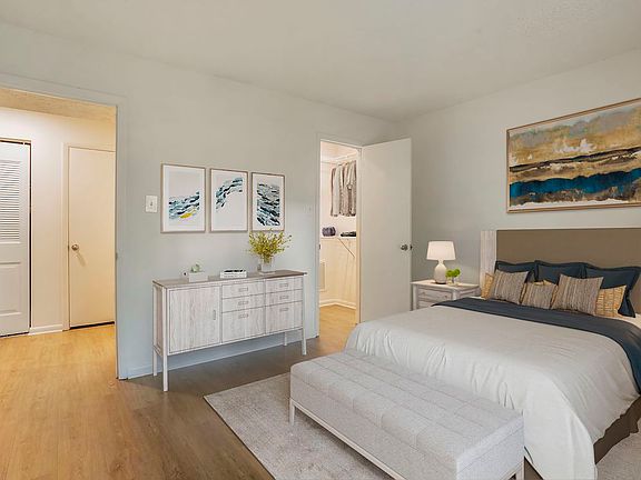 Finish Package IV bedroom with hard surface flooring and walk-in closet