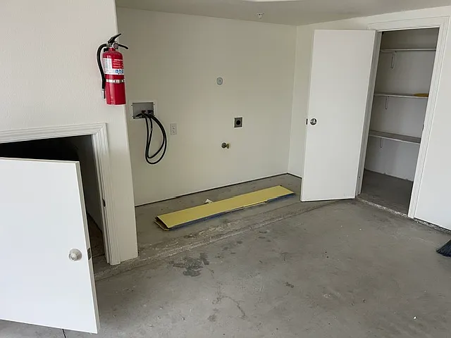 Garage- the two storage areas (which have doors) and the area with washer and dryer hook-ups. This is part of the 2 car garage.