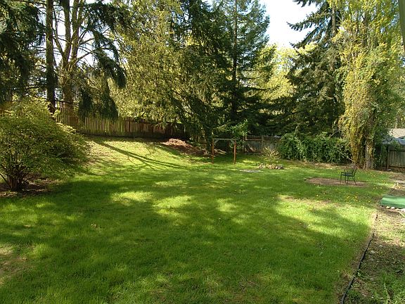 Even on hot days, this home and backyard are comfortable wired for hot tub