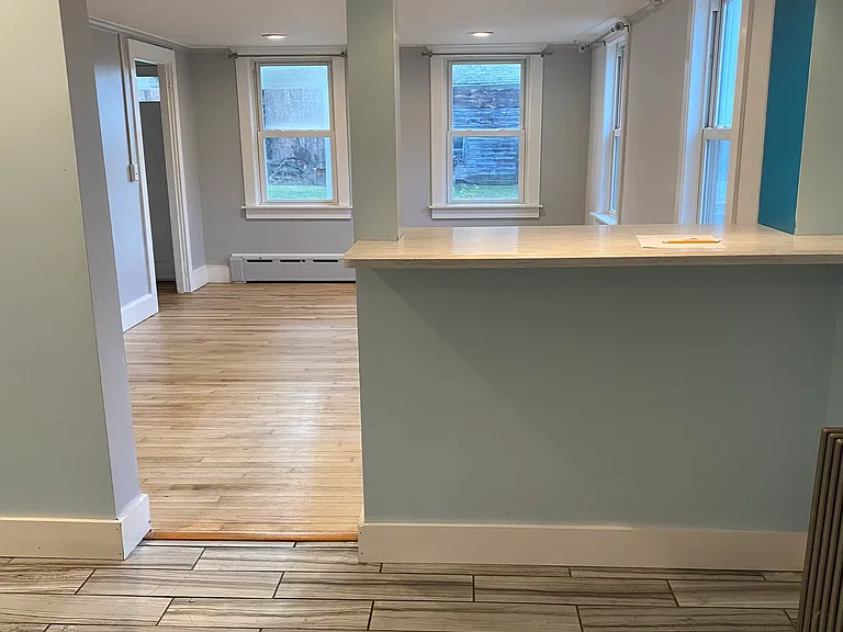 Kitchen looking into living room