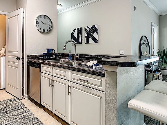 Create, entertain, and indulge in elegance within our modern and open kitchen spaces.