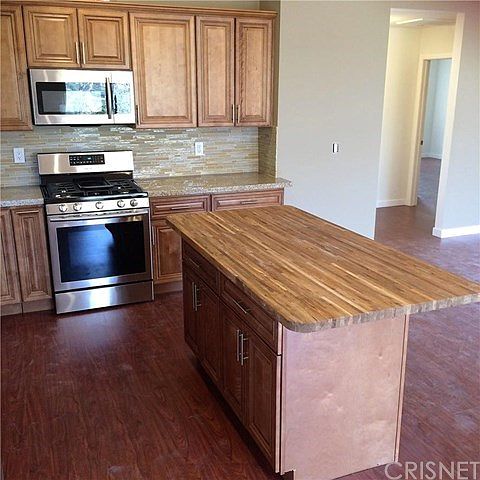 solid wood Butcher block with room for bar stools