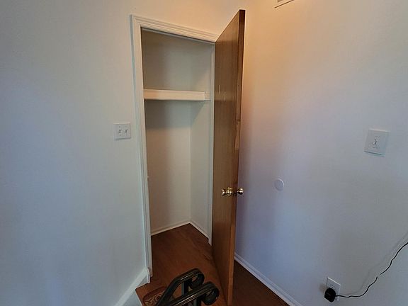 Entry closet at top of stairs.