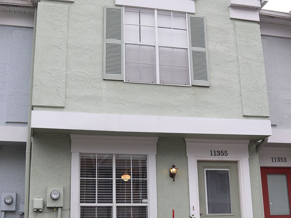 Victorian style 2-story Condo with community outside maintenance. Parking in front of unit.