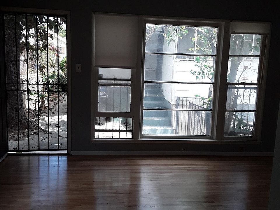 back house living room looking out at the house in the front.