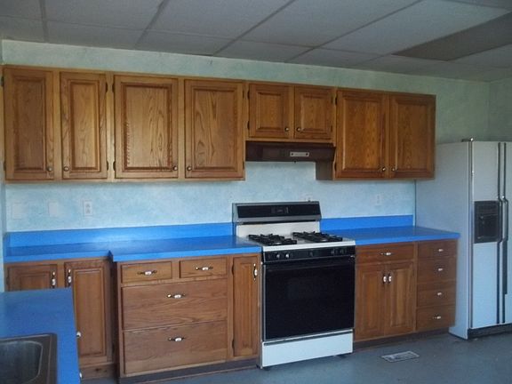 Plenty of cupboards, gas stove