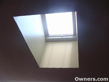 Sensor Remote Skylight in Dining Room