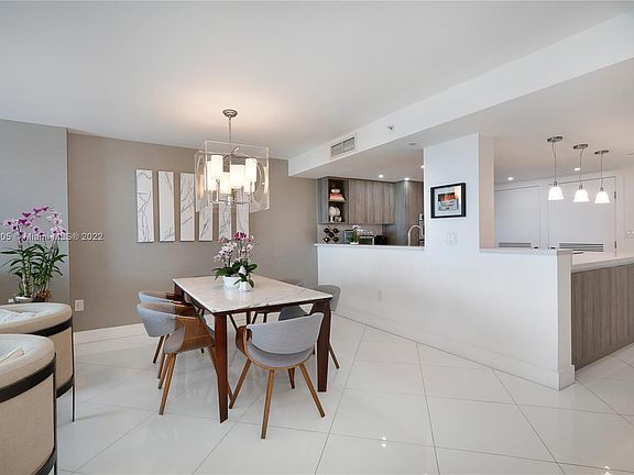 High quality custom Italian Kitchen by Veneta Cucine.  Quartz countertop by Compac.