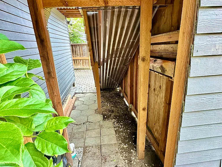 Additional outdoor storage under the stairs coming from the deck. Has room for a bike, some coolers and things that can be exposed to the elements.