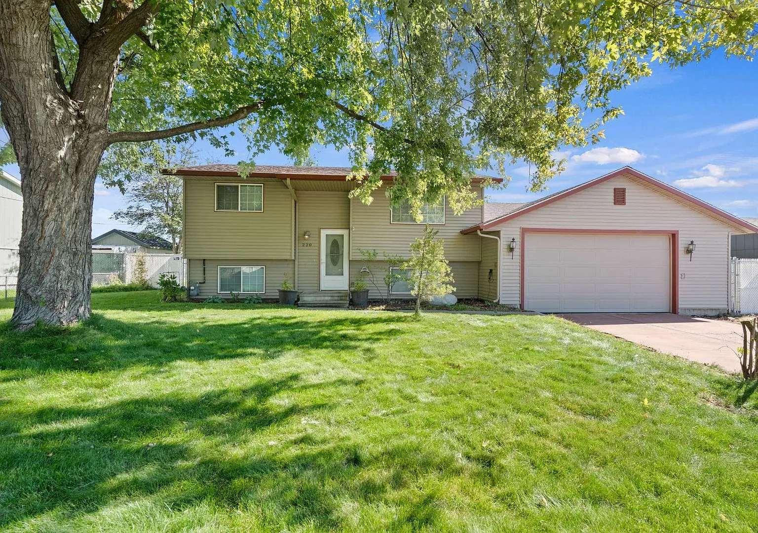4 Bed 2 Bath Split Level home fully updated in Central Valley Greenacres neighborhood — Photo 1