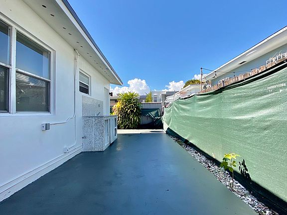 Big, private wrap-around backyard