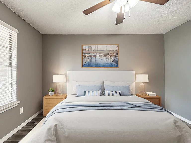 Bedroom with Overhead Lighting and Fan