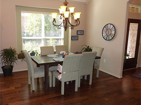 Dining area is bright and airy
