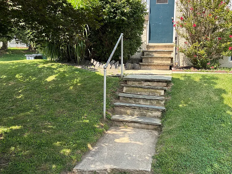 Off street parking, private driveway, backyard and front porch