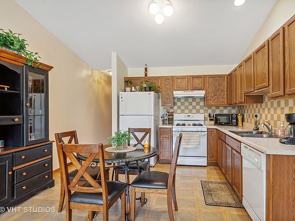 This shows the dining area and the kitchen--there is room for a hutch on the wall of the dining area