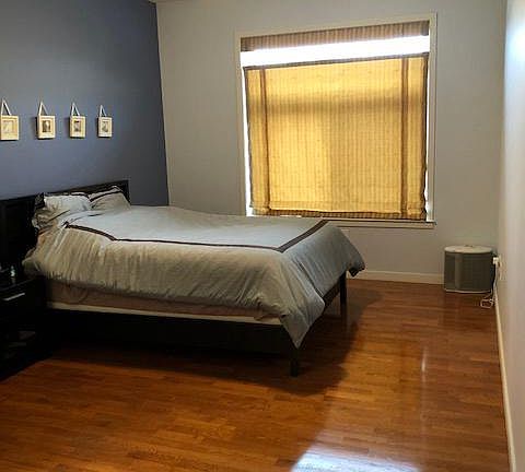 Large master bedroom with walk-in closet.