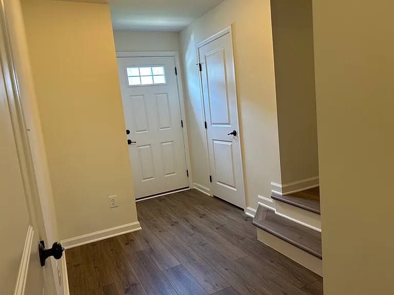 New flooring at Entrance, Bonus room, Kitchen & Living. New wall paint all through the house