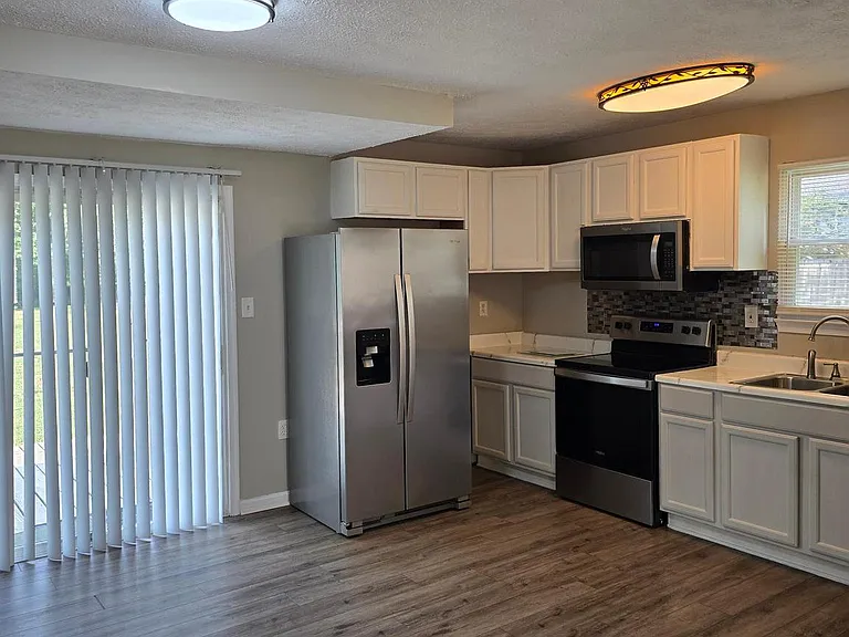 8313 Gibbons Dr — Photo 3