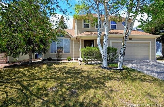 ?Nice curb-appeal with matured trees including beautiful aspens