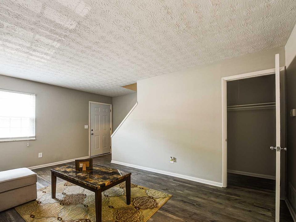 Huge Storage Closet with shelving in Livingroom.