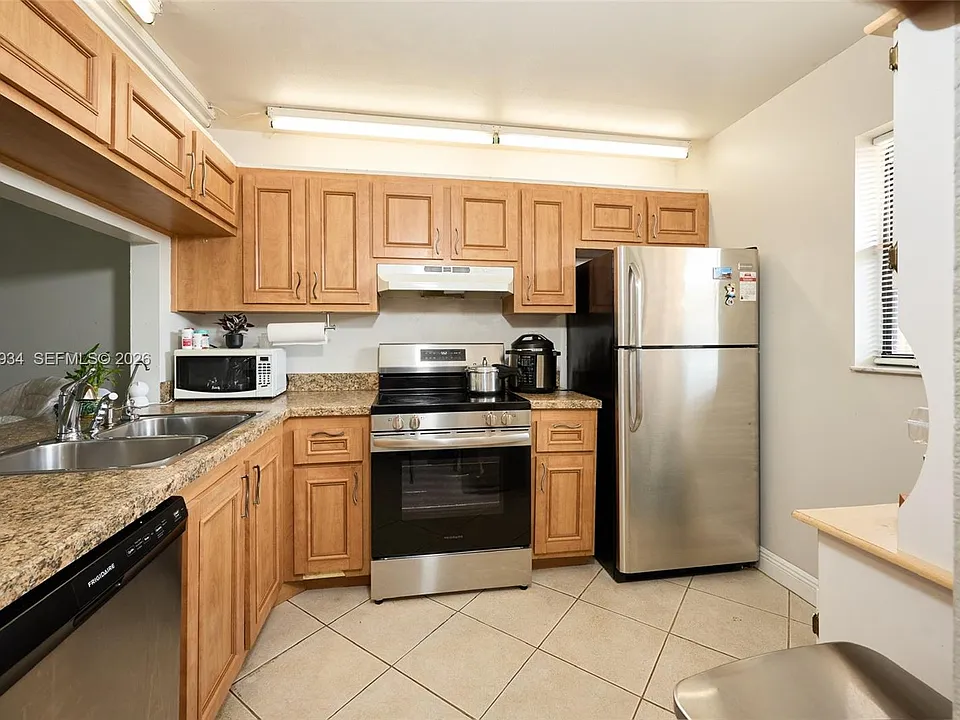 940 NW 104th Ave #203