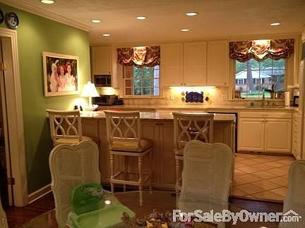 Kitchen/Breakfast Room
						:
						Granite
Large bar counter
Window treatments stay.
Ceiling fan
Door to garage