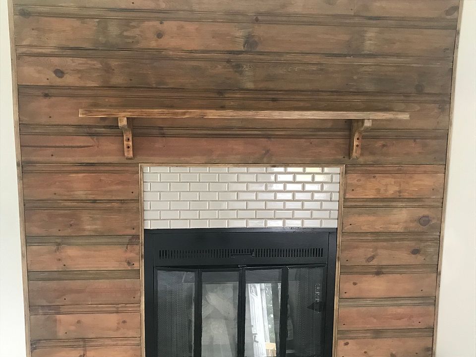 Pine and tile fireplace