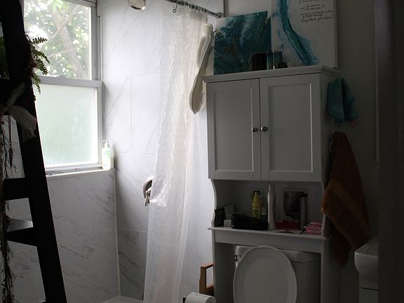 Right next to the washer/dryer, on the third floor