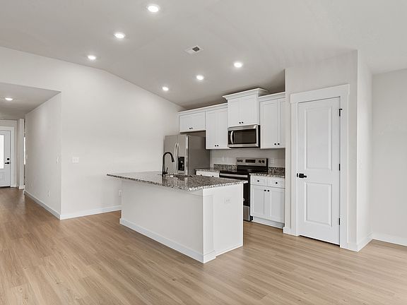 The kitchen has granite countertops