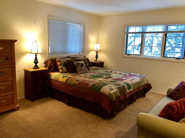 Master bd with king bed, sofa, dresser, walk-in closet