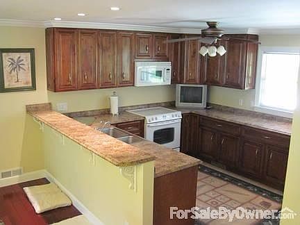 Dining/Family Room
						:
						View from Foyer