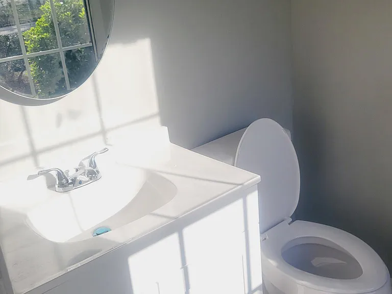 Master Bath with Tilting Frameless Mirror
