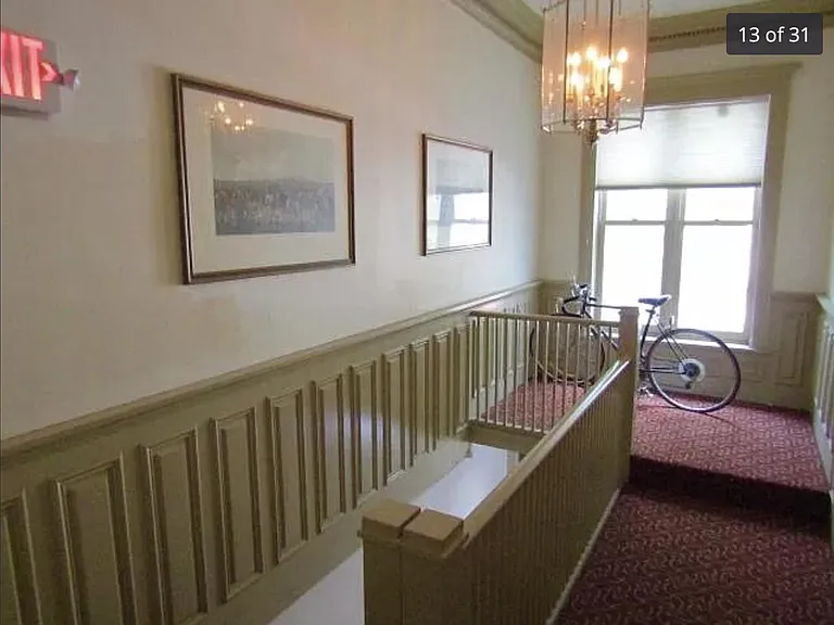 Townhouse 2nd floor landing with room for safe bicycle storage