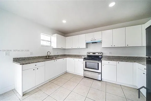 705 NW 13th Ter — Photo 3