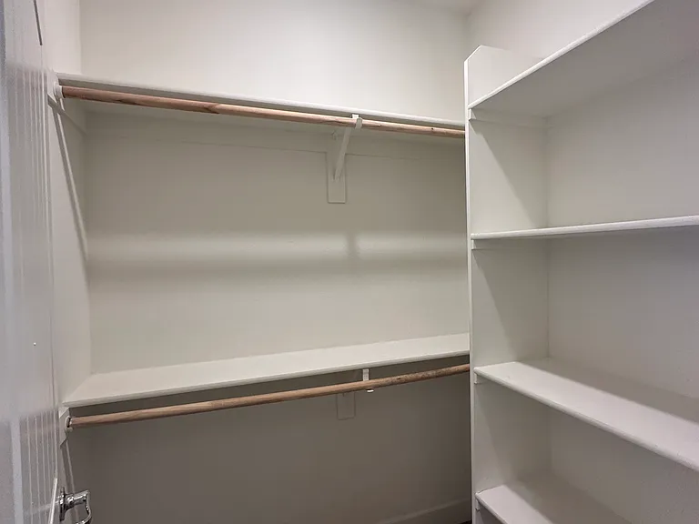 2 same sized closet in the master bedroom