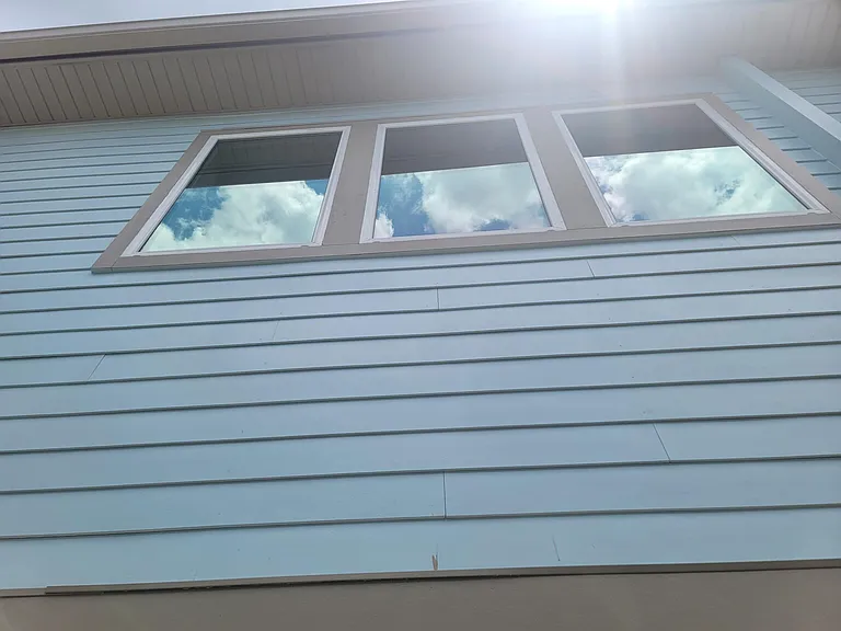 Large west facing windows that welcome you up the stairs.