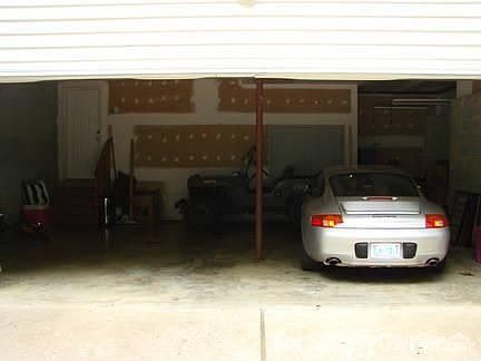 Large 2 Car Garage (With Room for More!) : Room for full two size cars, a motorcycle with tons of pr
