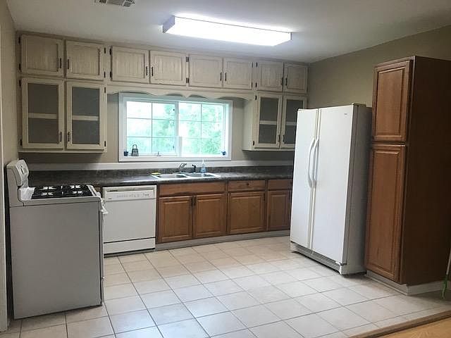 Kitchen. Appliances Provided. Tile is 1 year old