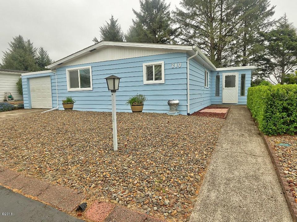 1st image of 310 NE 32nd St
