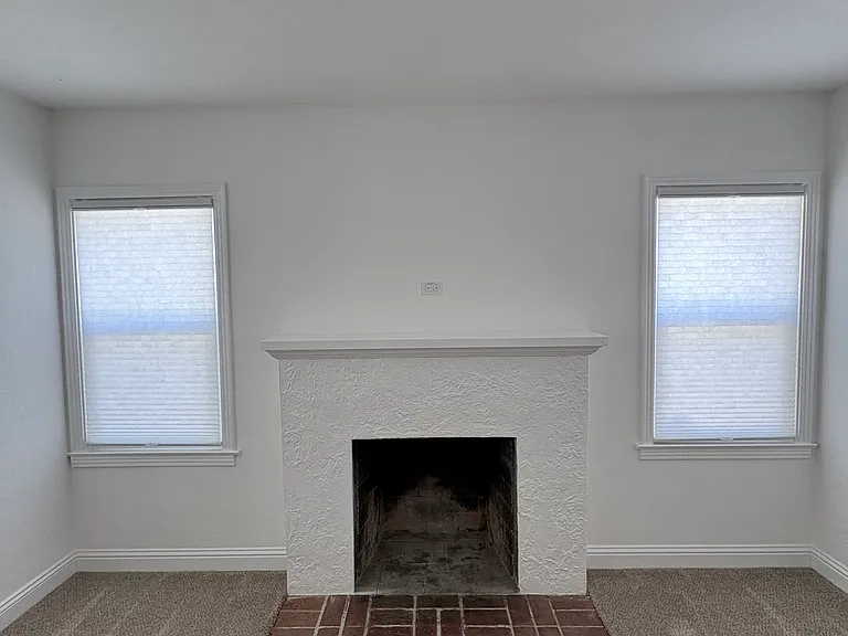 Living room, from front door entry area towards fireplace