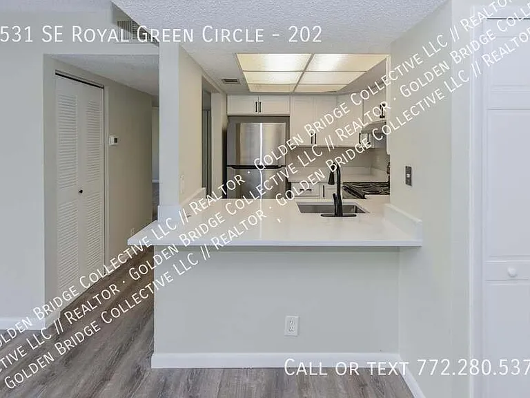 1531 SE Royal Green Cir #202 — Photo 1
