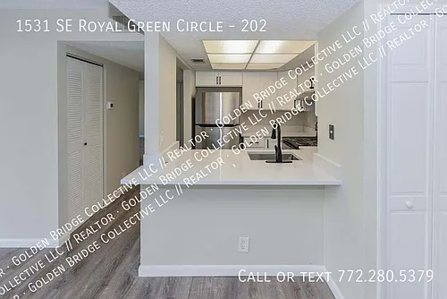 1531 SE Royal Green Cir #202 Photo 1