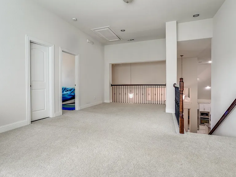 Empty room featuring carpet floors