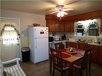 Kitchen with outside entrance.