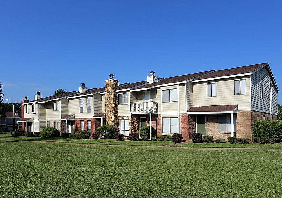 Experience comfortable living in these inviting two-story apartments, perfectly nestled in a peaceful suburban setting.