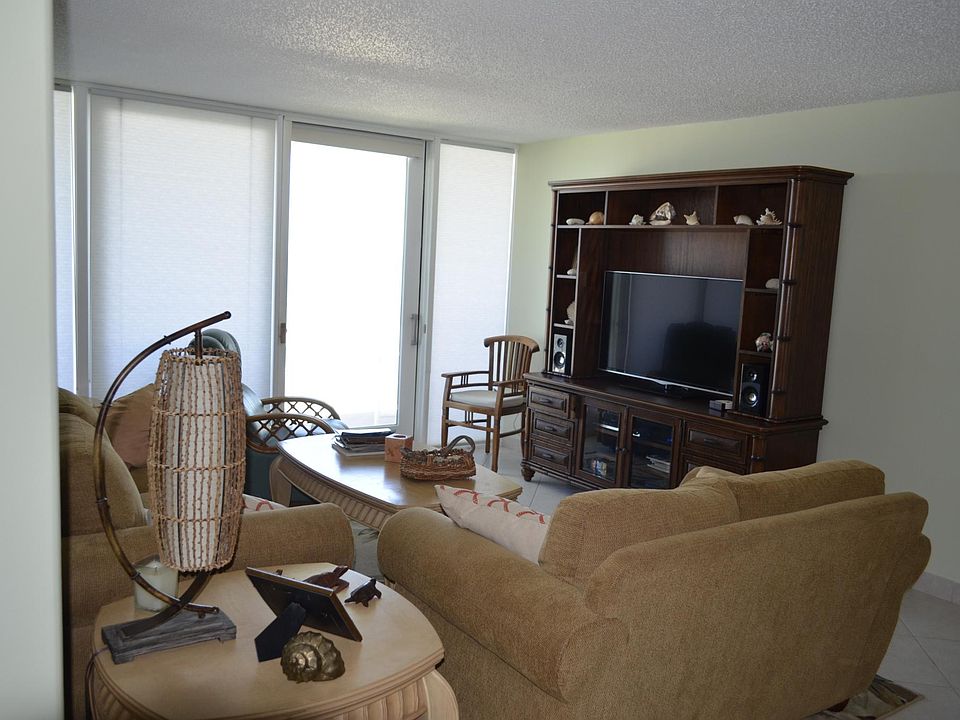 View of living area looking toward balcony.