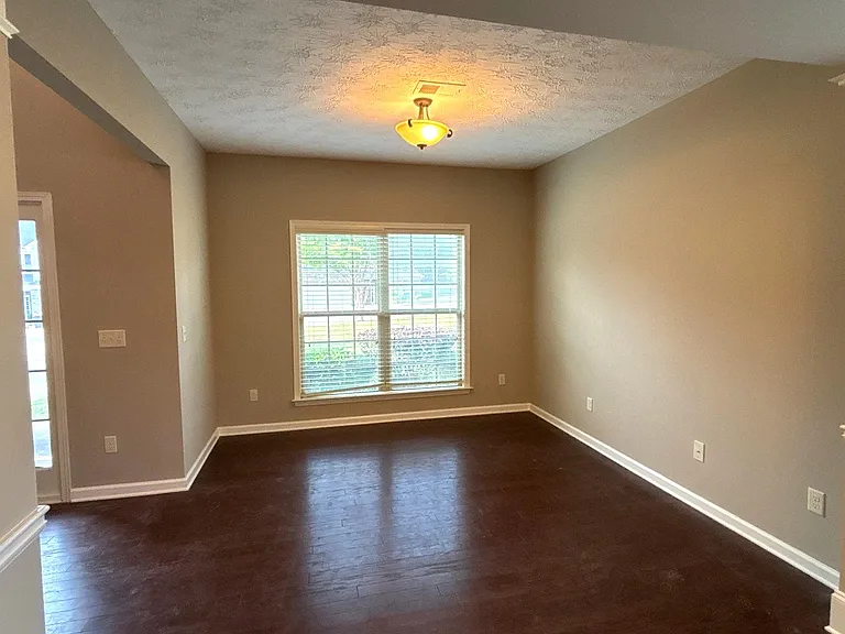 Additional Living / Reading / Office at front of house with hardwood floor