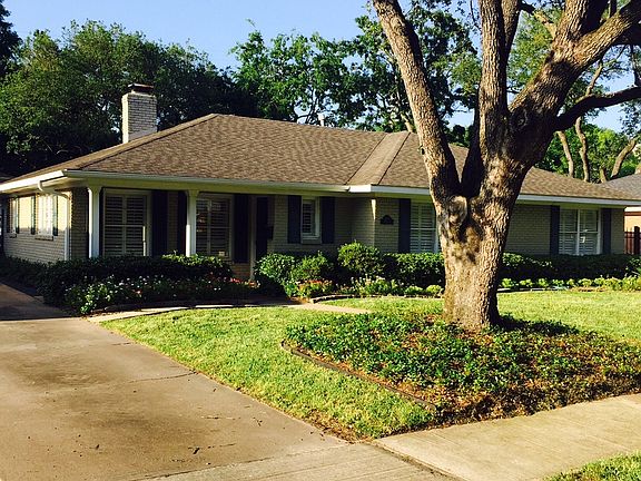 Home is beautifully landscaped with great curb appeal