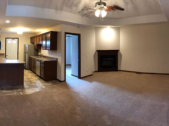 Kitchen, bar area, and upstairs living room