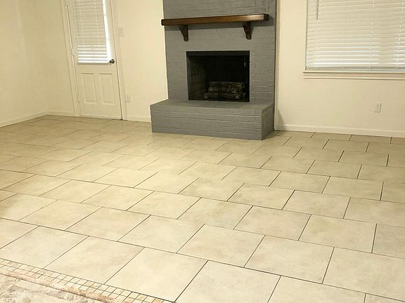 The open concept kitchen, dining and living space has a wood-burning fireplace. The chimney was recently swept and is ready for you cozy, fall and winter crackling fires. The back porch is large and covered. The backyard has a picnic table and storage bui
